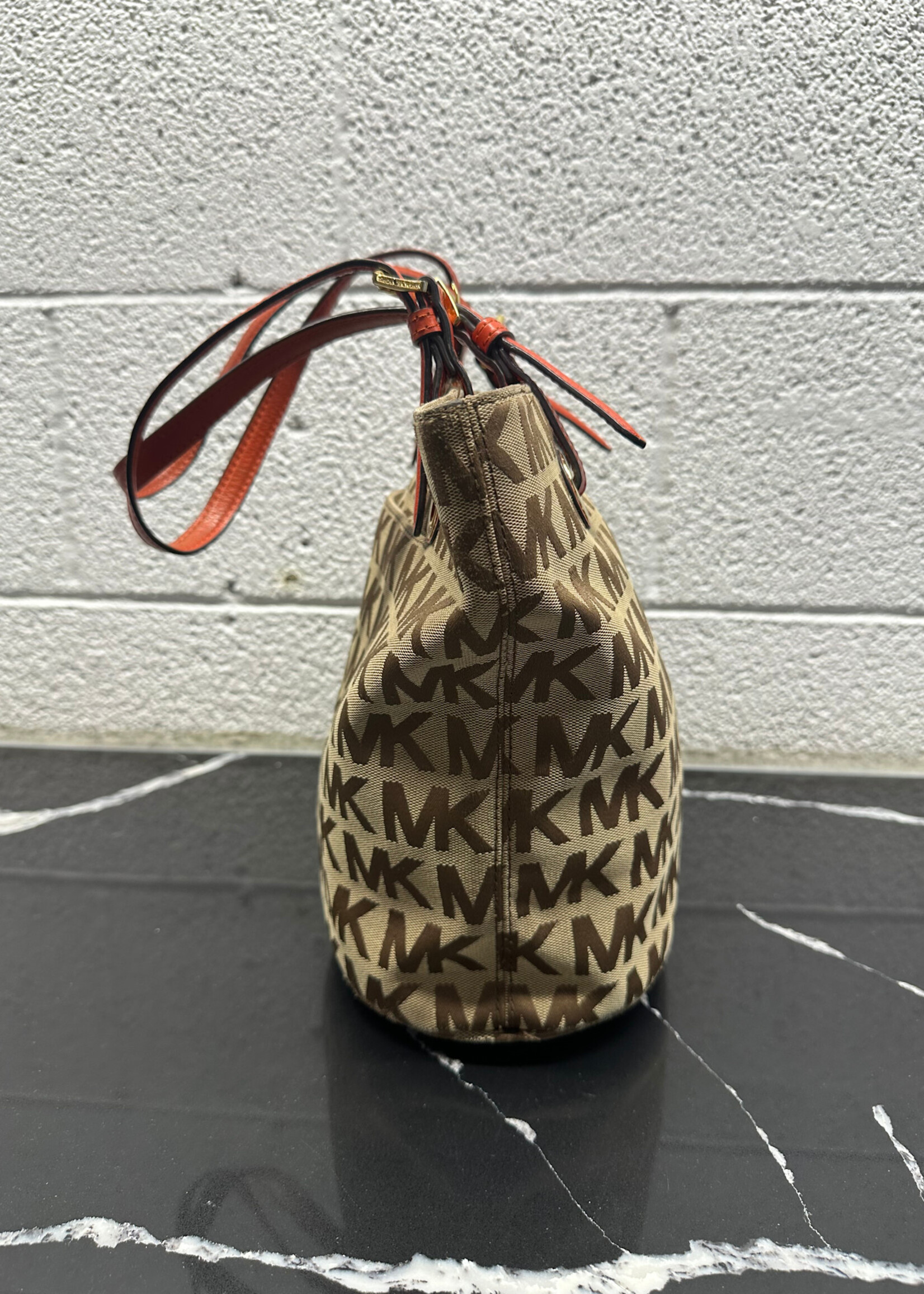 MK MONOGRAM ORANGE STRAP SHOULDER BAG