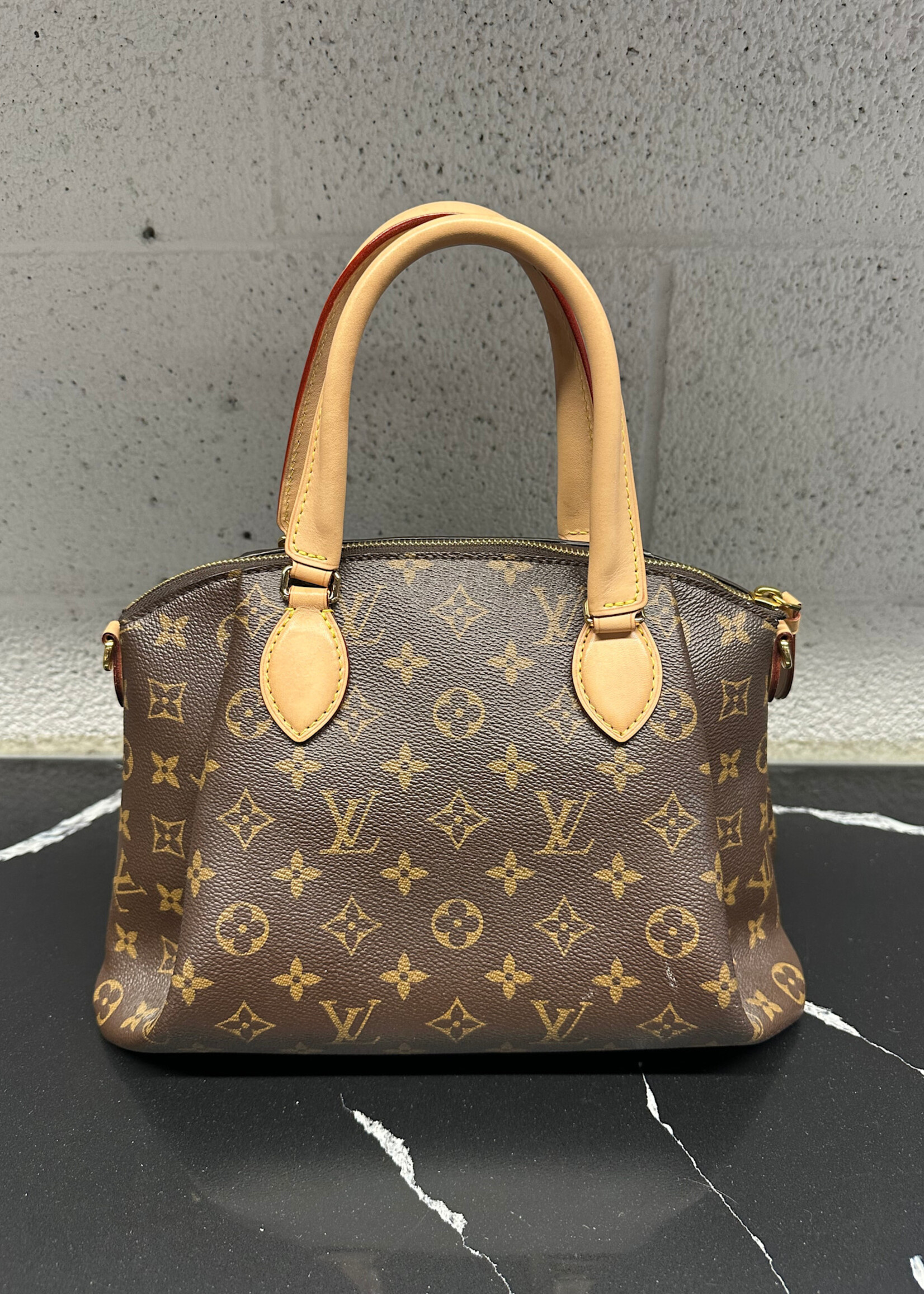 Louis Vuitton Rivoli PM Monogram Handbag