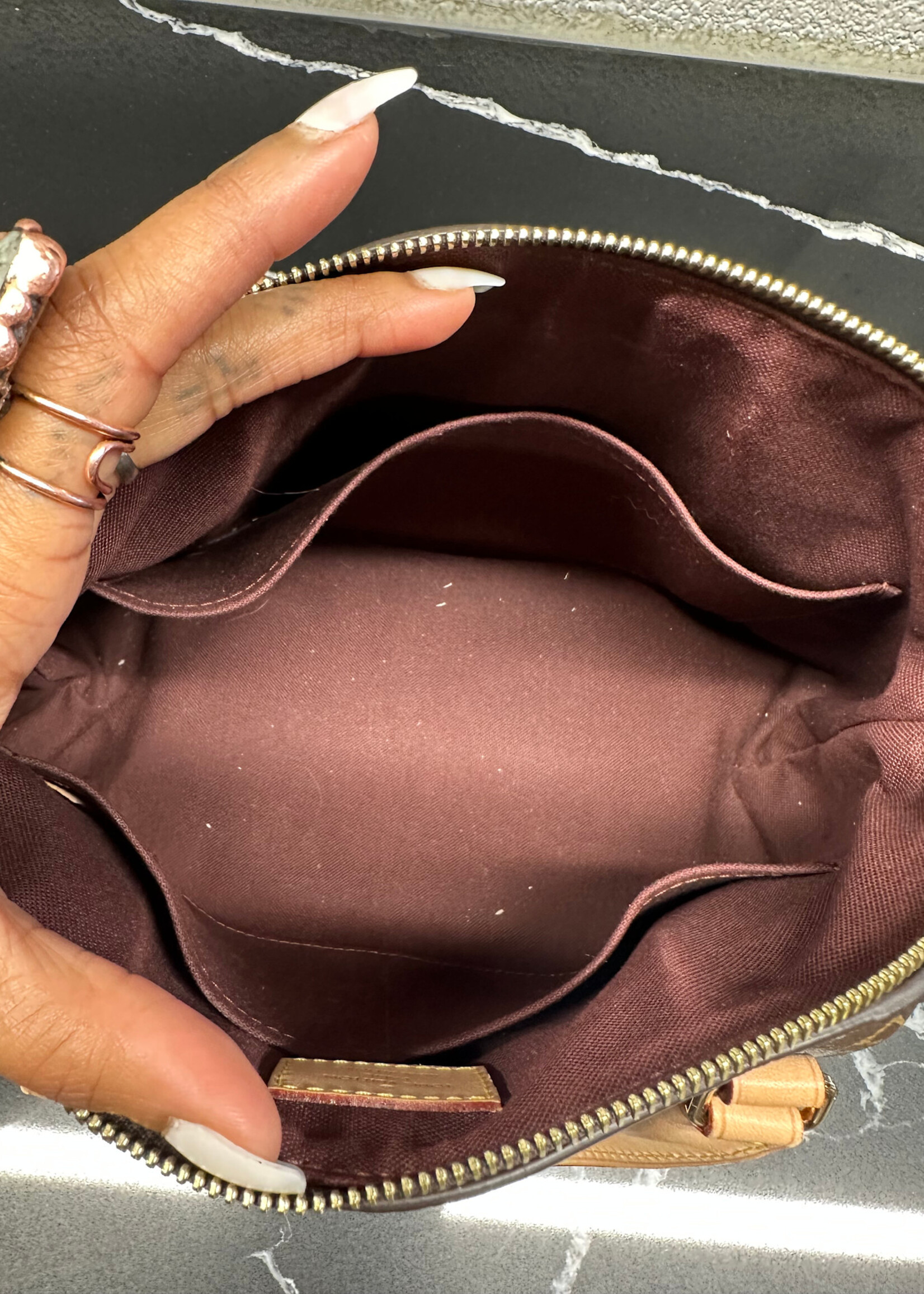 Louis Vuitton Rivoli PM Monogram Handbag