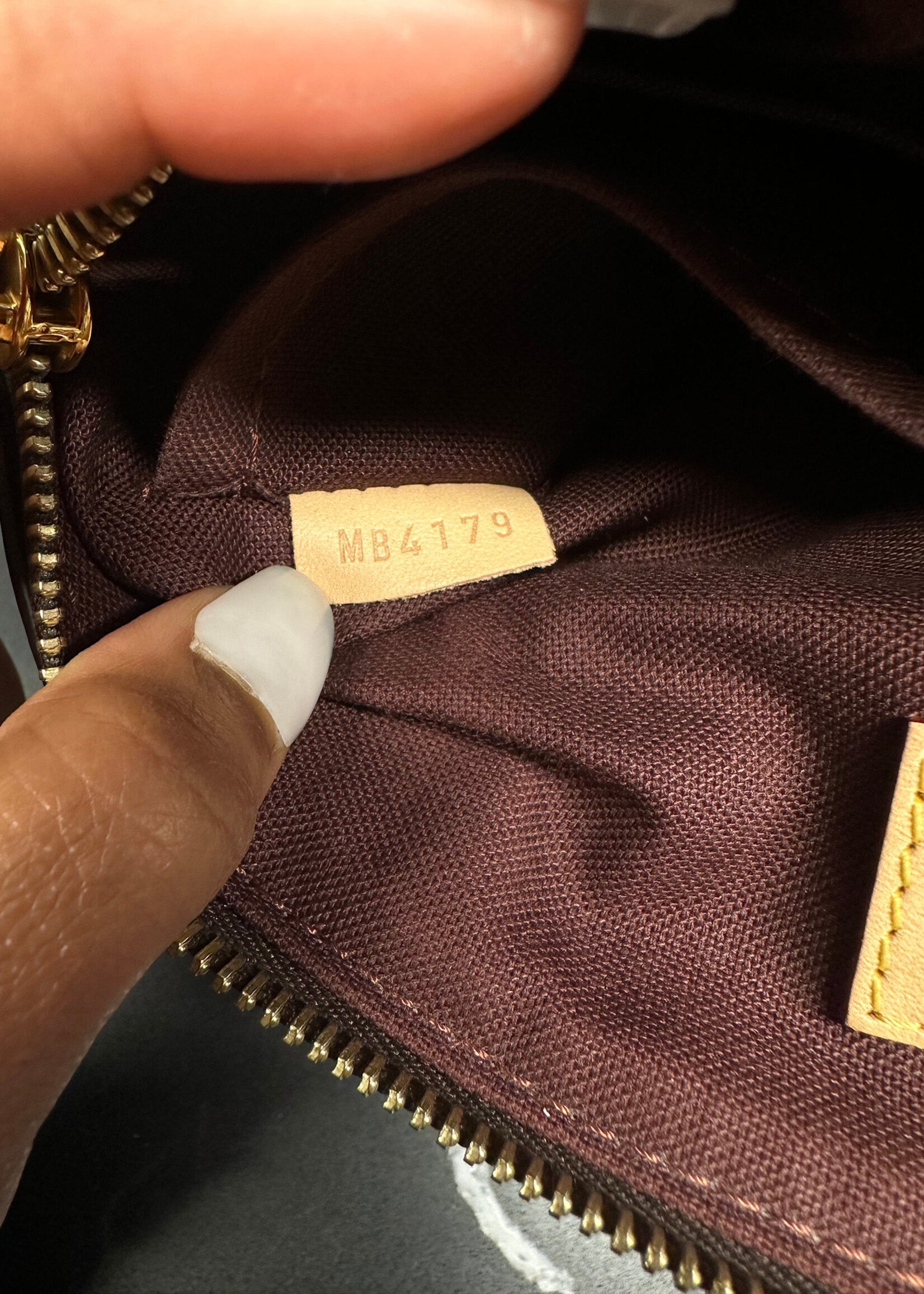 Louis Vuitton Rivoli PM Monogram Handbag