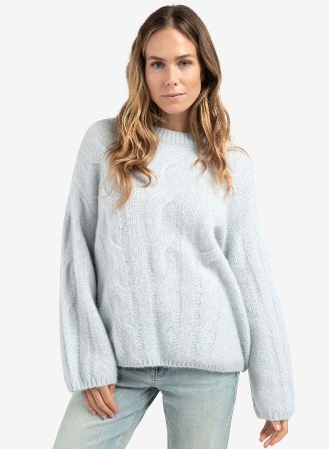 Tricot Yaya à mailles torsadées bleu pâle