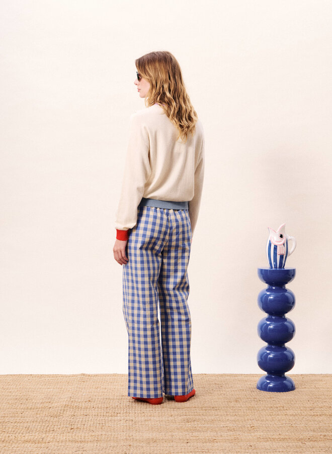 Cardigan Frnch Paris Patrick crème avec bordure verte, rouge, bleue & mauve