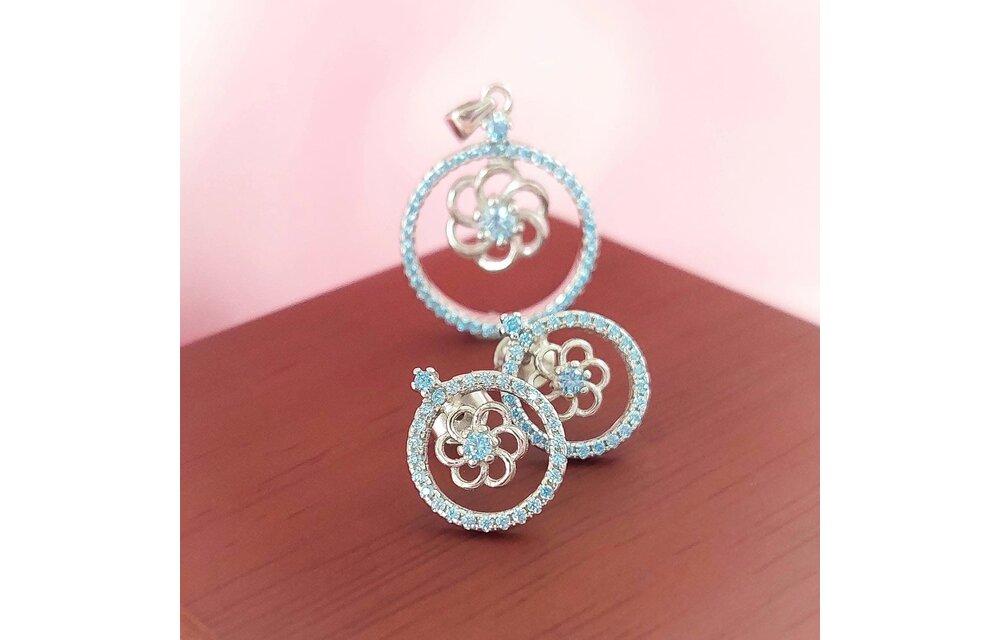 JUEGO FLOR EN CIRC CELESTE PLATA 925