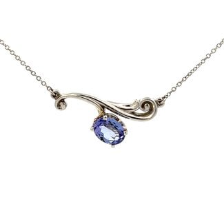 Oval Tanzanite Floral Scroll Bar Necklace on a 14k White Gold cable chain 18”; 1.00ct Tanzanite