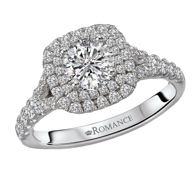 Romance Created in high polished 14kt white gold, this ring showcases a stunning cushion shaped halo lined with sparkling diamonds thats surrounds the 3/4 carat round center stone.  (D 3/4 carat total weight)