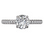 Romance This 14kt white gold semi-mount engagement ring has round diamonds along he shaft on either side of a hidden halo underneath a center setting that will accommodate a 6.5mm round diamond. (D 1/5 carat total weight)