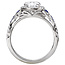 Romance This beautiful 14kt white gold semi-mount ring has diamond and sapphires along the shaft and a halo of diamonds surrounding a setting that will accommodate a 6.5mm round diamond. (D 1/5 carat total weight, S 3/8 carat total weight)