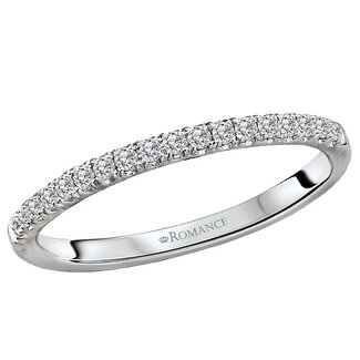 Romance This wedding band features a row of sparkling round diamonds micro set in polished 14kt white gold. (D 1/7 carat total weight)