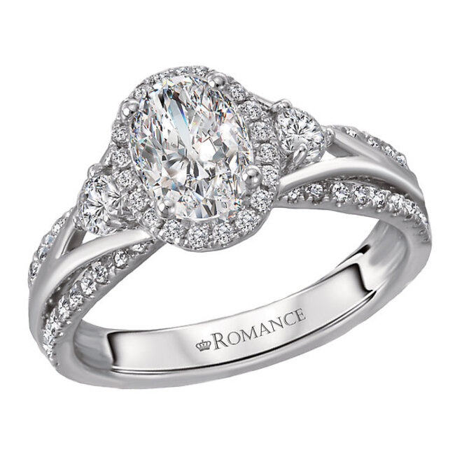 Romance This diamond ring features intertwined shanks lined with brilliant cut diamonds, set in high polished 14kt white gold.  A beautiful halo and two additional round diamonds. (D 1/2 carat total weight)
