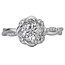 Romance This 14k white gold bridal ring features a round center surrounded by sparkling diamonds and twisted gold. (D 1/5 carat total weight)This SEMI-MOUNT ring comes with NO CENTER STONE but it will accommodate a 6.5mm round center.