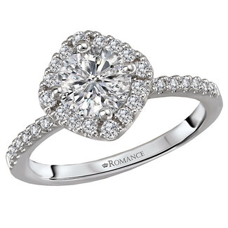 Romance This elegant bridal ring features a cushion shaped halo surrounding the center stone consisting of sparkling round diamonds set in high polished 14k white gold. (D 1/4 carat total weight)