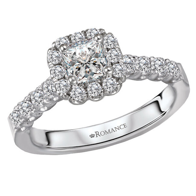 Romance This cushion halo engagement ring showcases a shank lined with sparkling diamonds set in high polished 14kt white gold and accommodates a 4.7mm cushion shaped stone.  (D 1/2 carat total weight)