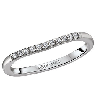 Romance This curved wedding band features round faceted diamonds set in 14kt white gold band. (D .09 carat total weight)