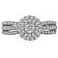 Romance This gorgeous split shank ring features triple rows of round sparkling diamonds that surrounds the center halo crafted in high polished 14k white gold. (D 3/4 carat total weight) This includes the 3.8-4mm center stone as shown)