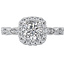 Romance Cushion shaped halo diamond ring in 14kt white gold with milgrain detail. (D 1/3 carat total weight) This item is a SEMI-MOUNT and it comes with NO CENTER STONE as shown but it will accommodate a 6.5mm round center stone.