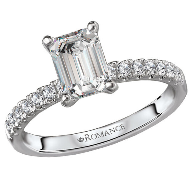 Romance Beautifully crafted from 14kt white gold, this semi mount engagement ring can accommodate an emerald cut 7x5mm stone of your choice and is surrounded by brilliant cut sparkling diamonds. (D 1/5 carat total weight)