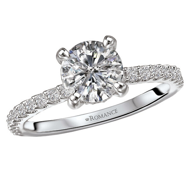 Romance This is a semi-mount 14kt white gold engagement ring with sparkling round diamonds along the band on either side of a center setting that will accommodate a 6.5mm round diamond. (D 1/3 carat total weight)