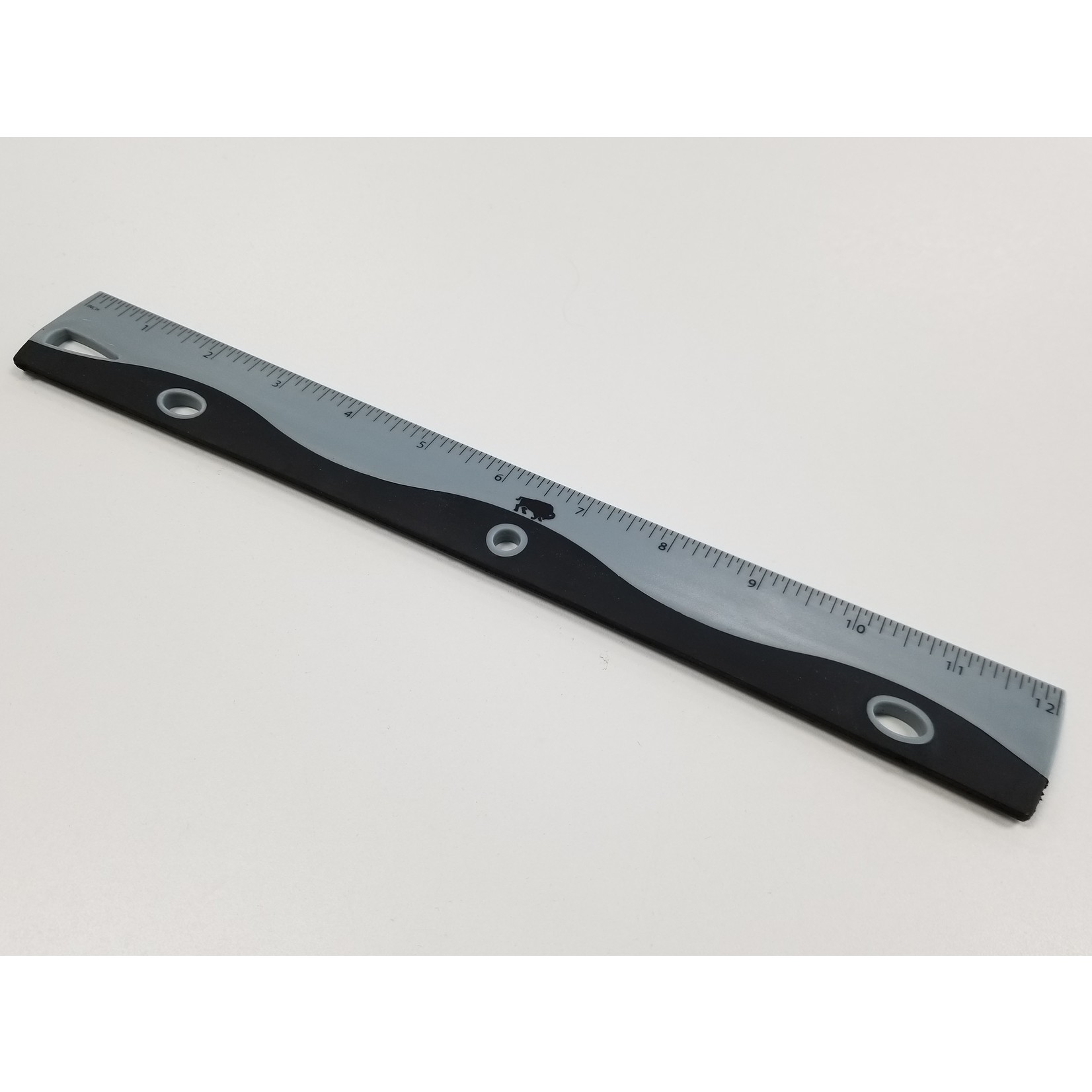 Ruler with binder holes