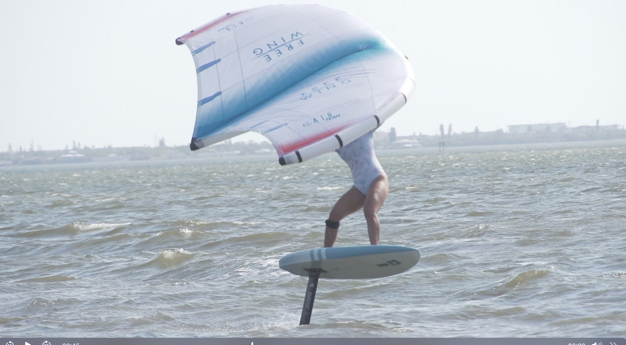 An athlete is wingfoiling at Cocoa Beach