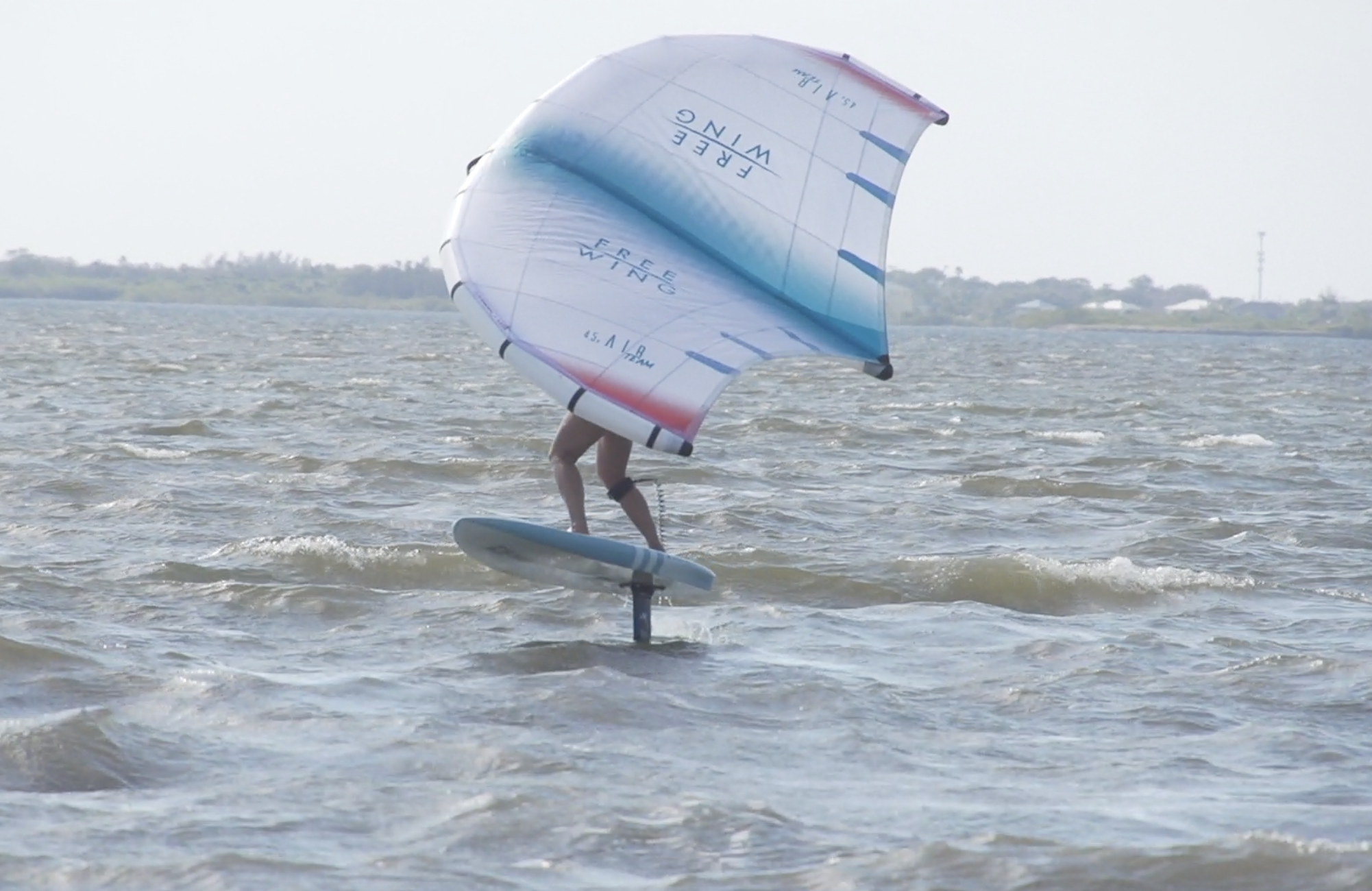 Woman wing foiling cocoa beach kelly park