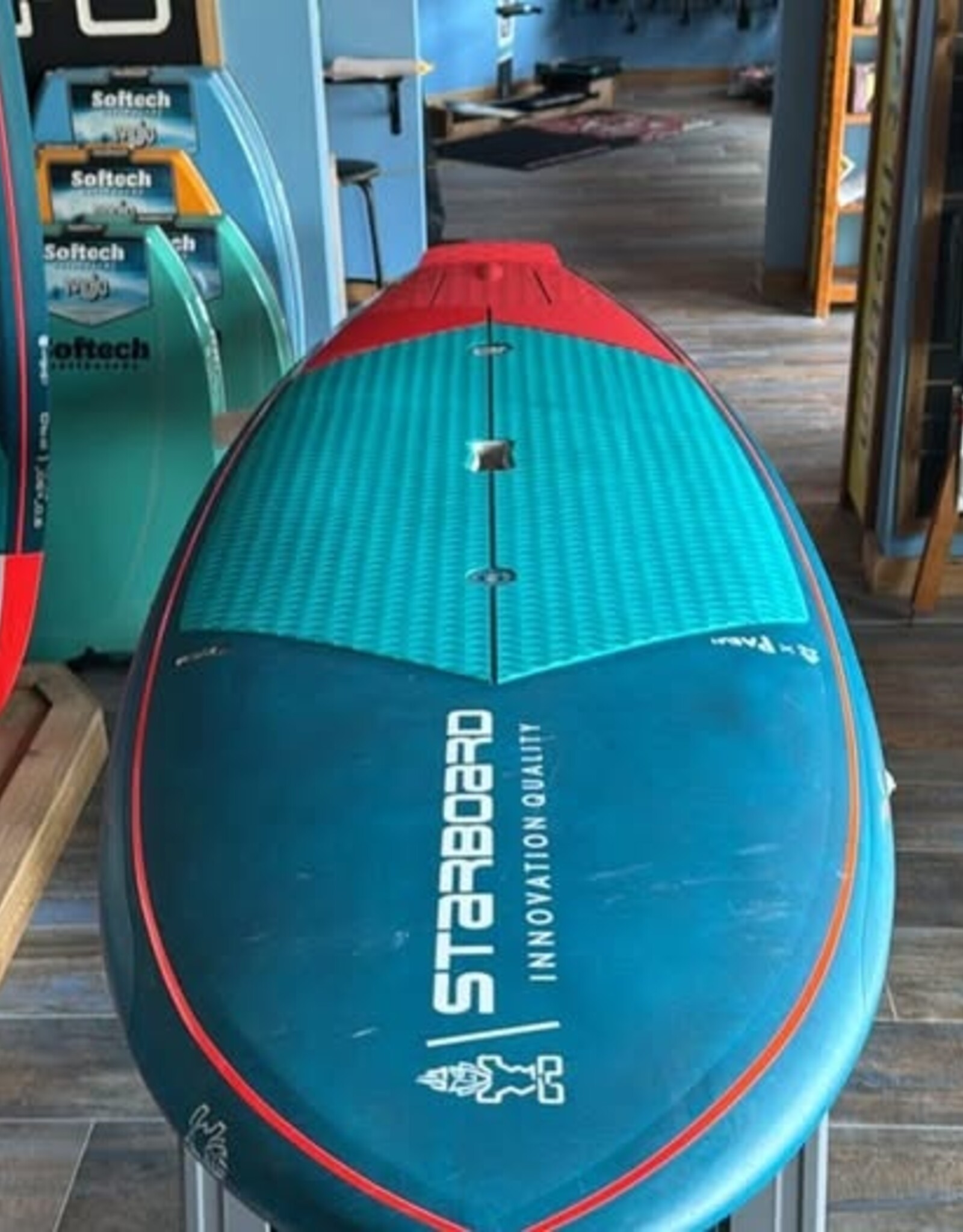 Starboard USED 2024 STARBOARD PRO 8'7" X 29.5" BLUE CARBON SANDWICH
