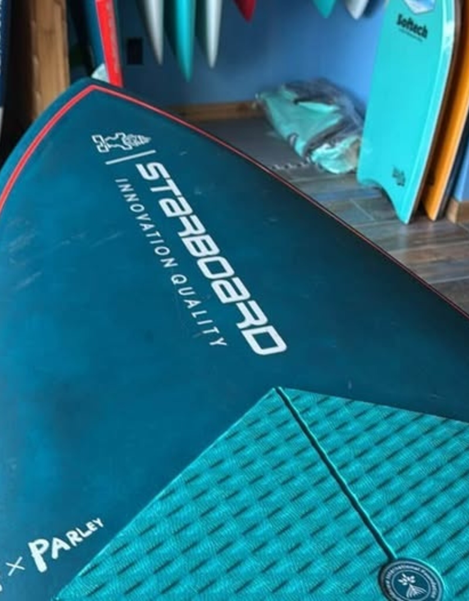 Starboard USED 2024 STARBOARD PRO 8'7" X 29.5" BLUE CARBON SANDWICH