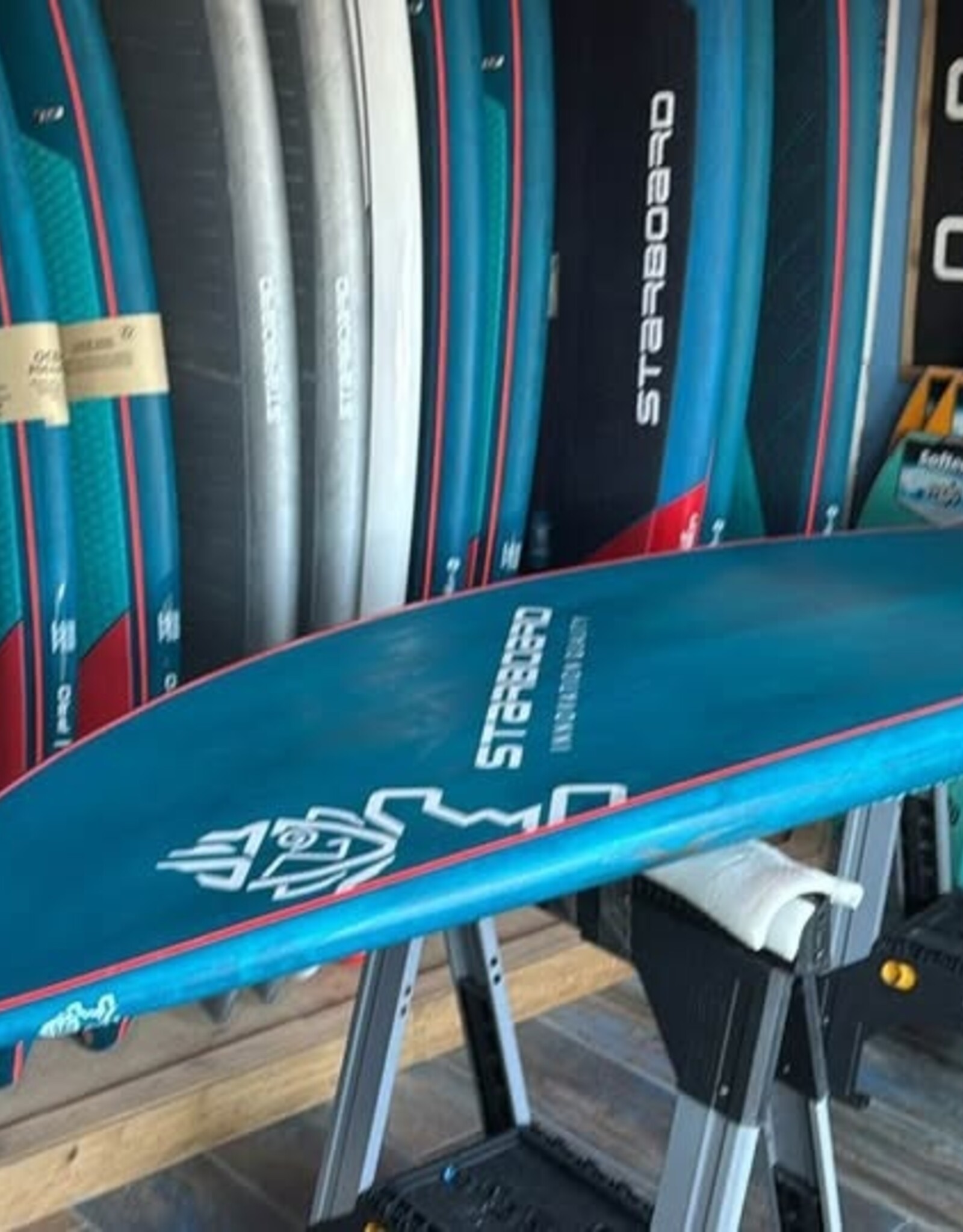 Starboard USED 2024 STARBOARD PRO 8'7" X 29.5" BLUE CARBON SANDWICH
