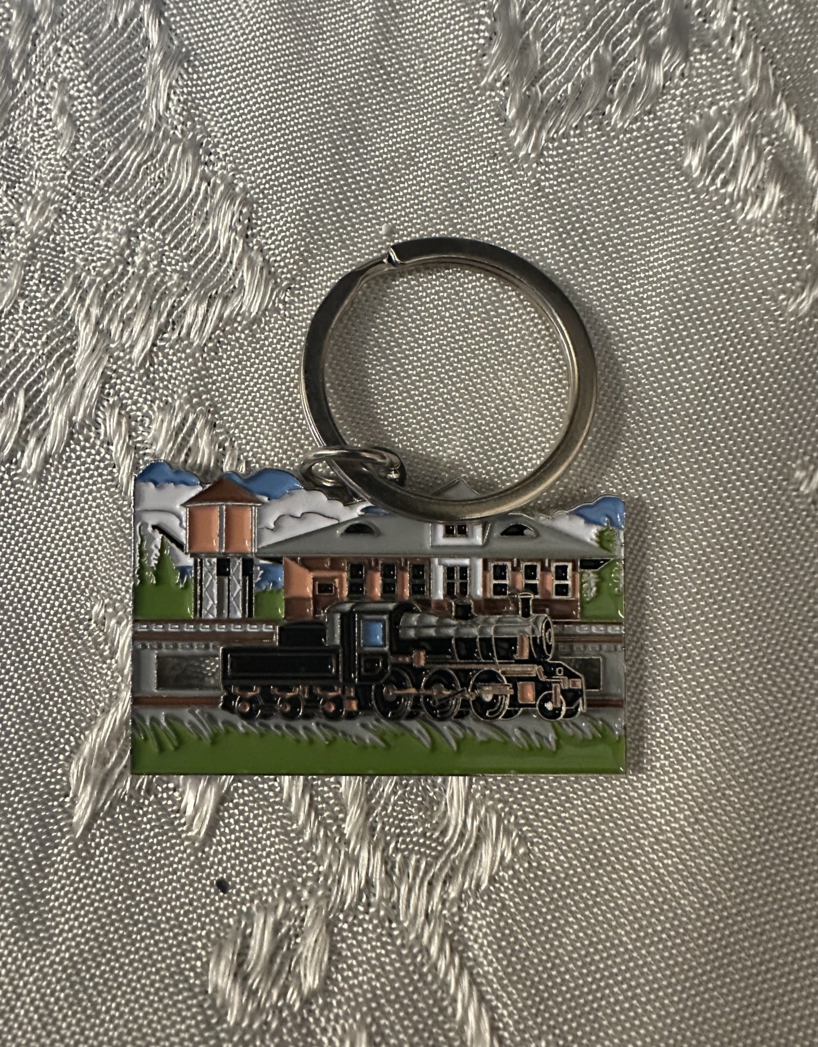 Charles Products Metal Keychain with Sliding Train