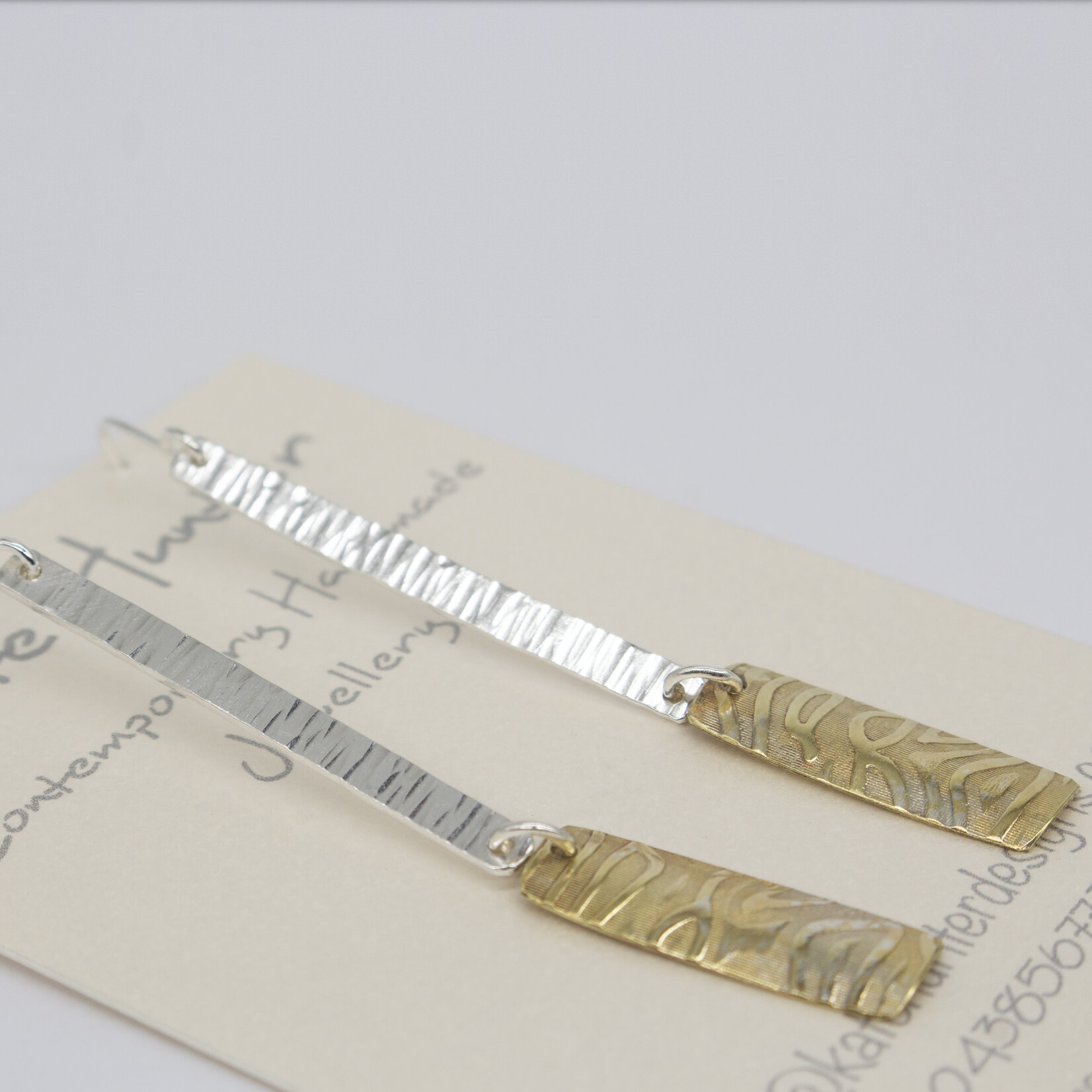 Handmade silver and brass earrings by Kate Hunter Designs