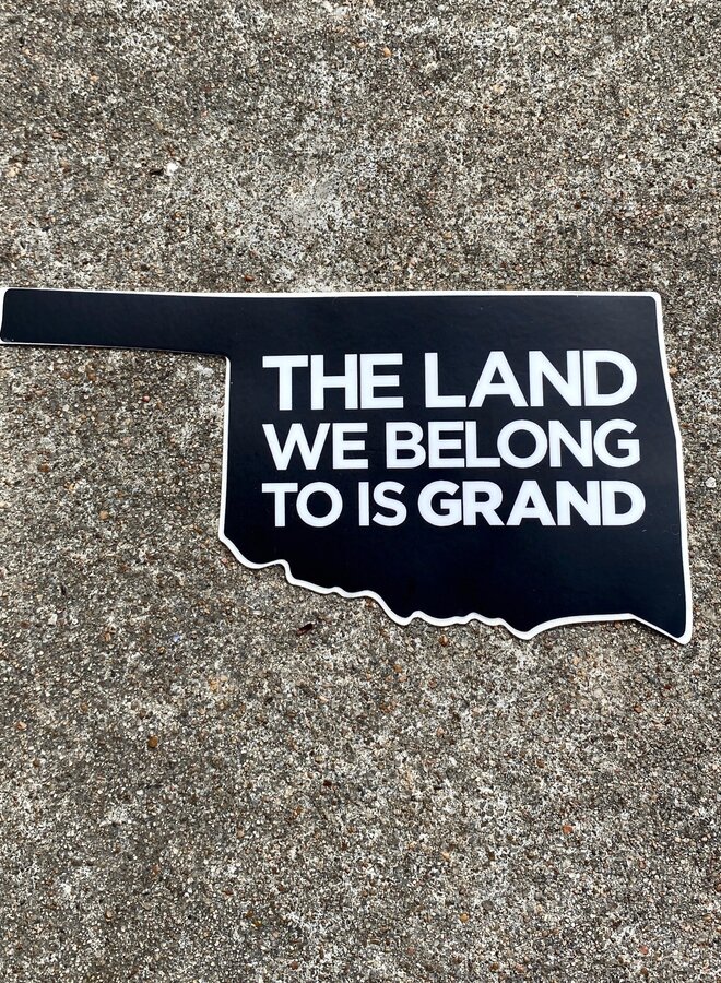 The Land We Belong To Is Grand Sticker