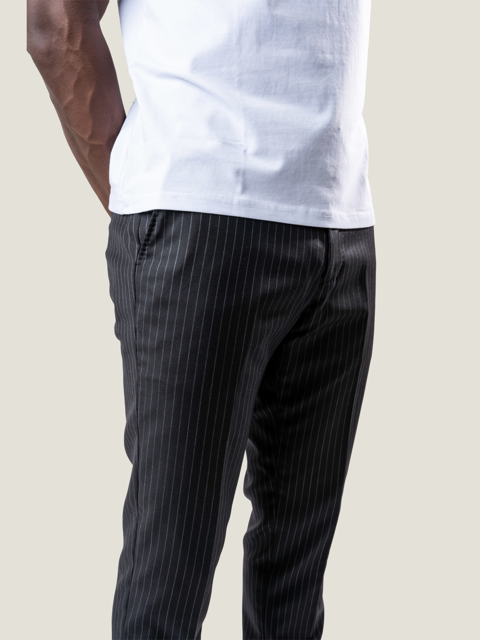 MAUVAIS Black Pinstripe Skinny Smart Trousers with Half Belt  MAUVAIS UK