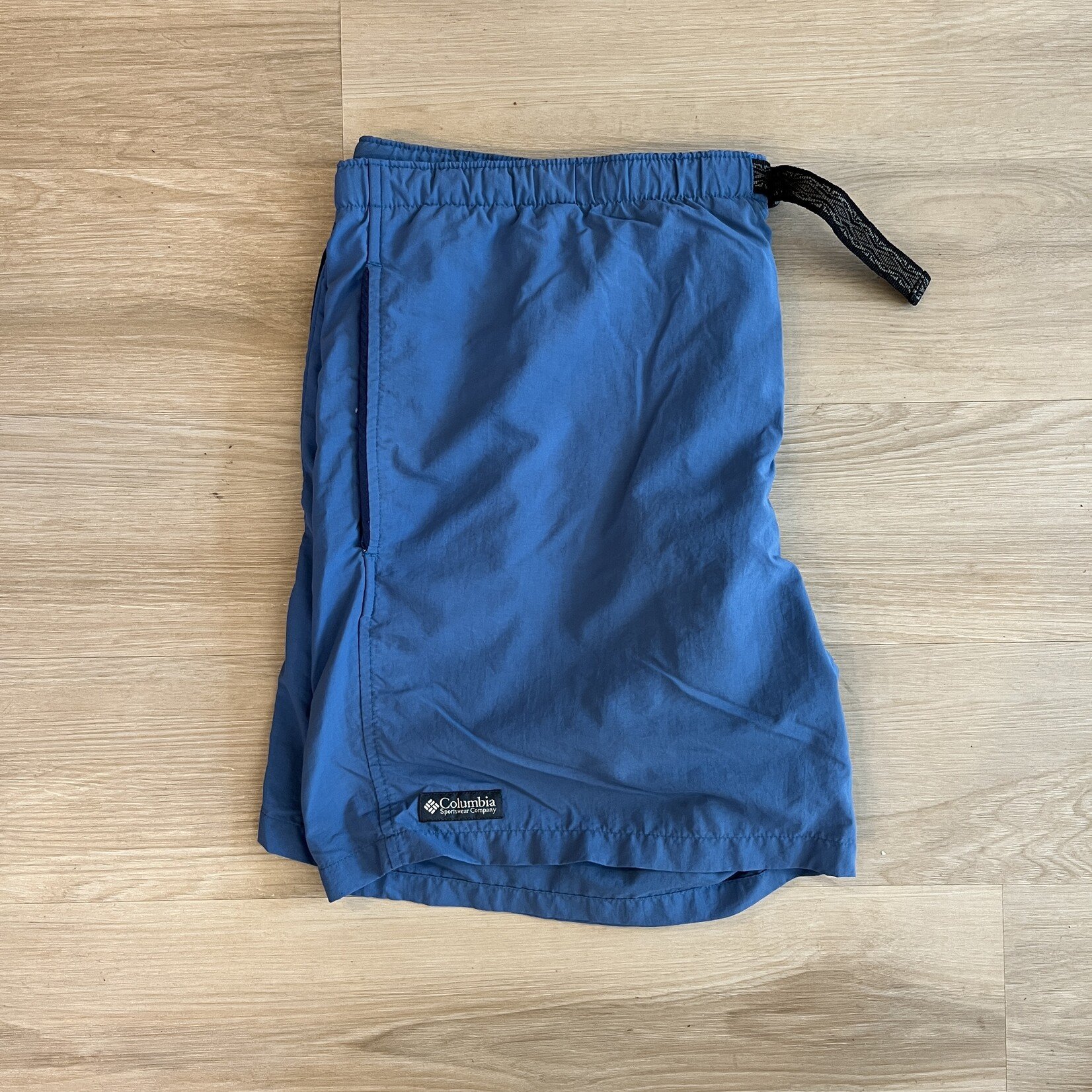13902	columbia blue board shorts sz. M