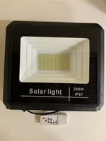 CIRCLE TRADING 200W SOLAR FLOOD LIGHT WITH REMOTE CONTROL AND SOLAR PLATE