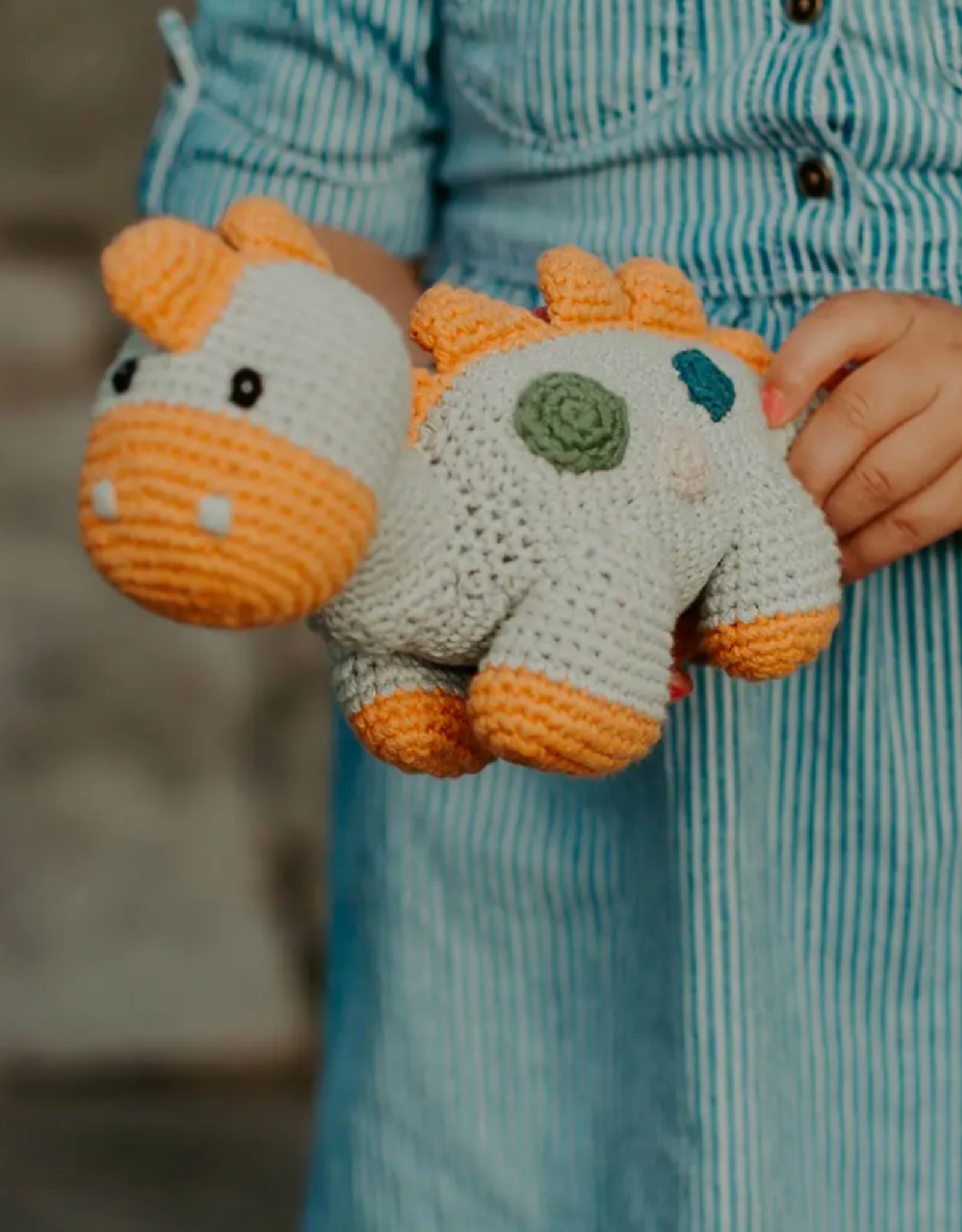 Pebble Steggy Dino Rattle Teal Organic
