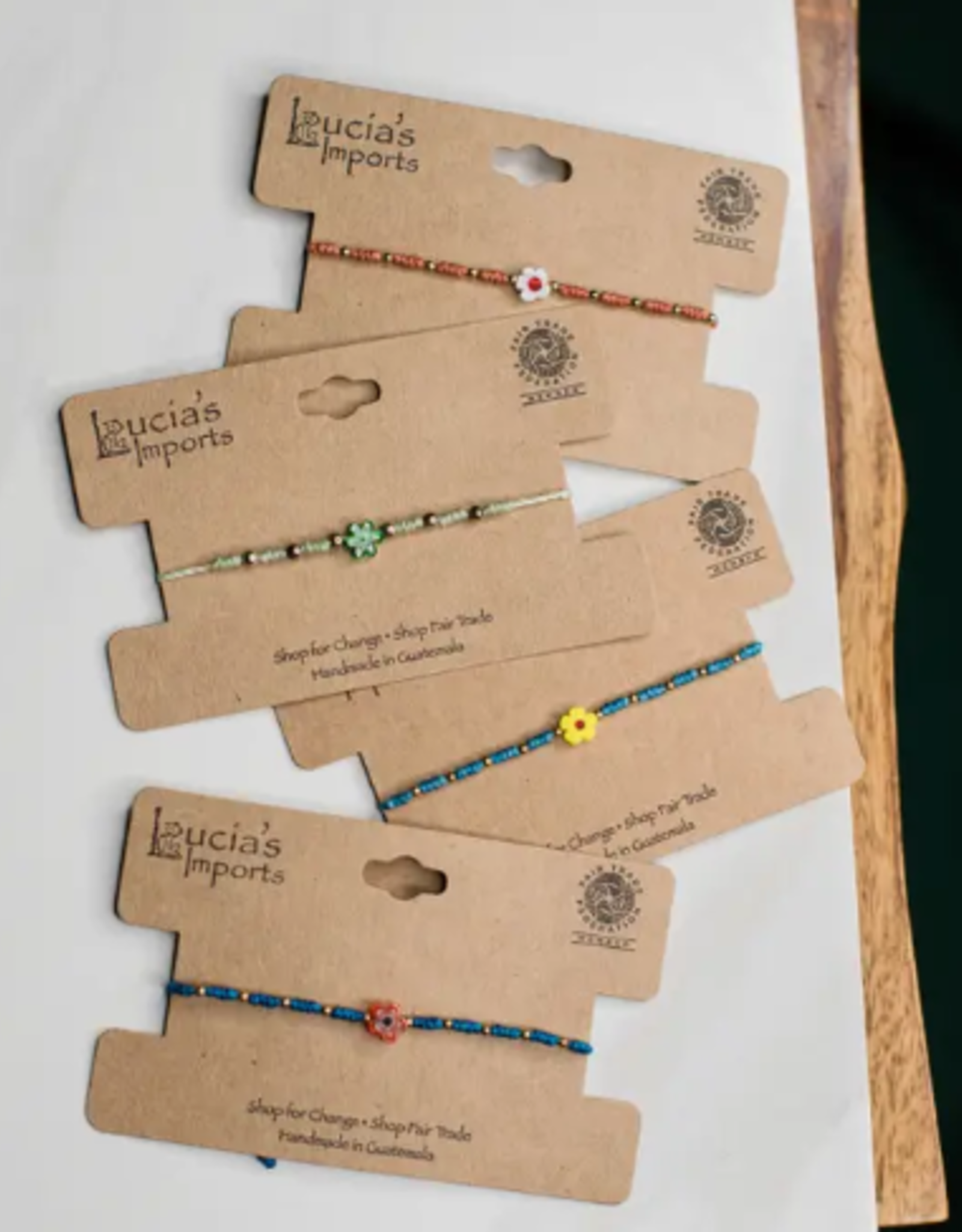 Lucia's Imports Flower Power String Bracelet
