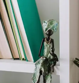 Ten Thousand Villages Share the Gift Statue