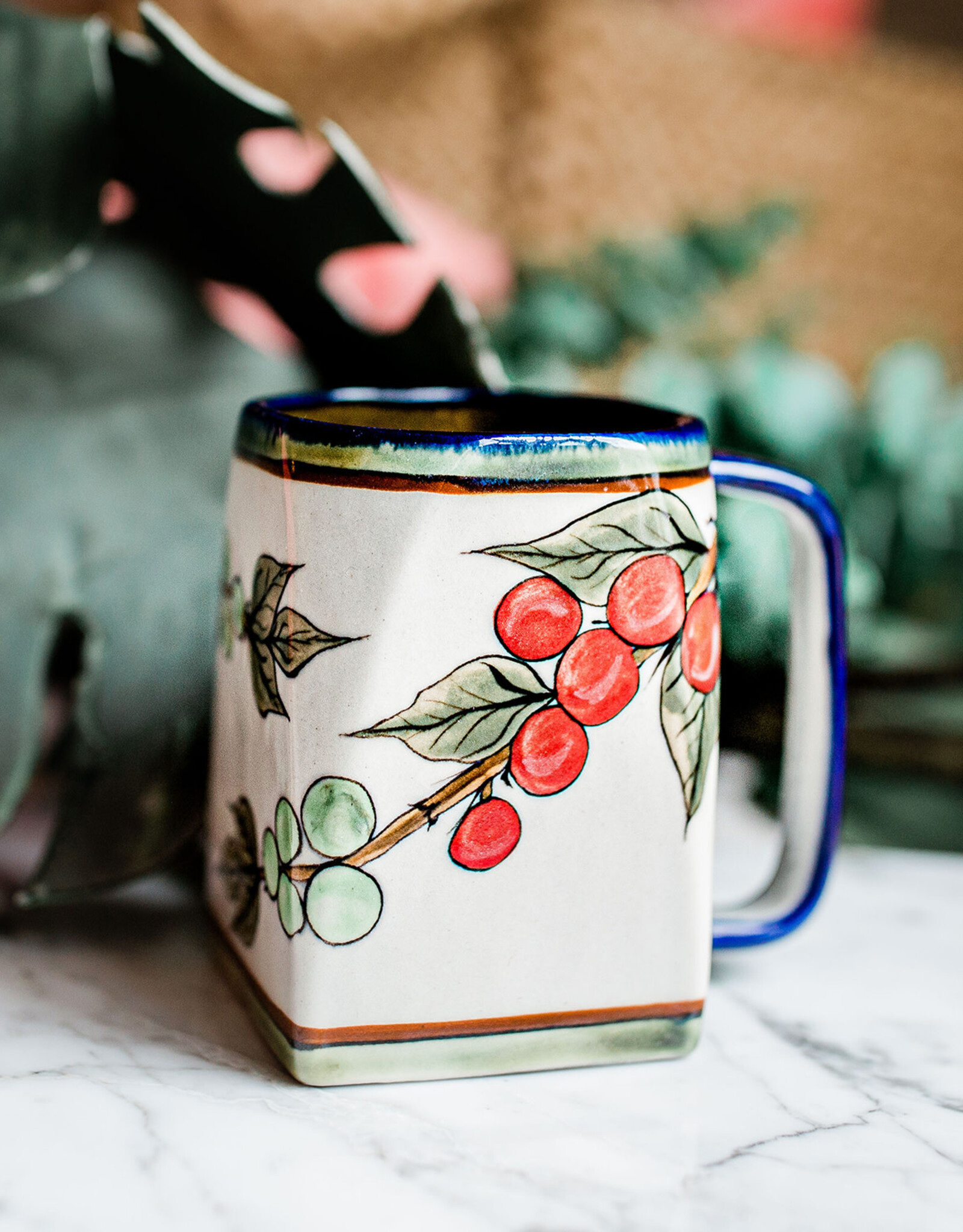 Lucia's Imports Café Café Mug
