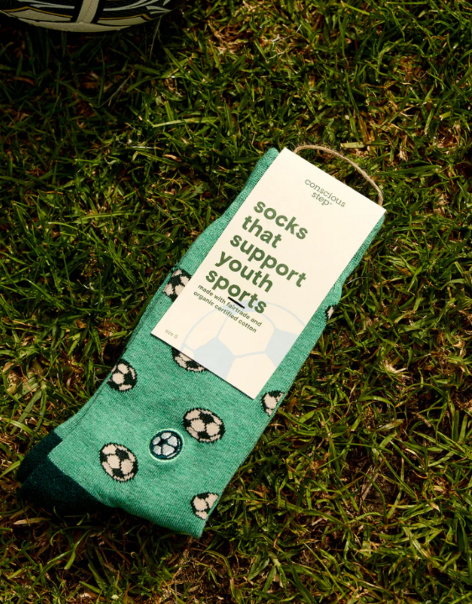 Conscious Step Socks that Support Youth Sports (Green Soccer Balls)