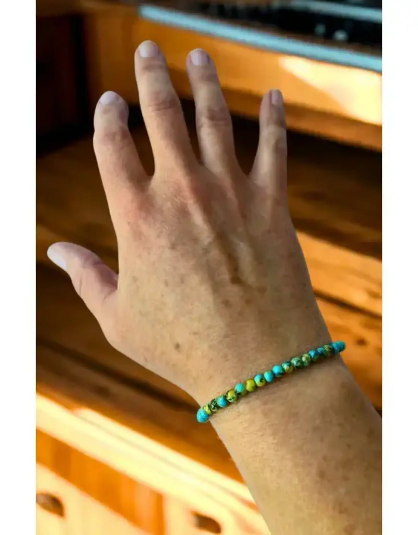 Ganesh Himal Glass Turquoise Bead Bracelet