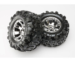 Traxxas 5673 - Tires & wheels, assembled, glued (Geode chrome wheels, Canyon AT tires, foam inserts) (2) (use with 17mm splined wheel hubs & nuts, part #5353X & beadlock-style sidewall protectors #5665, #5666, #5667)