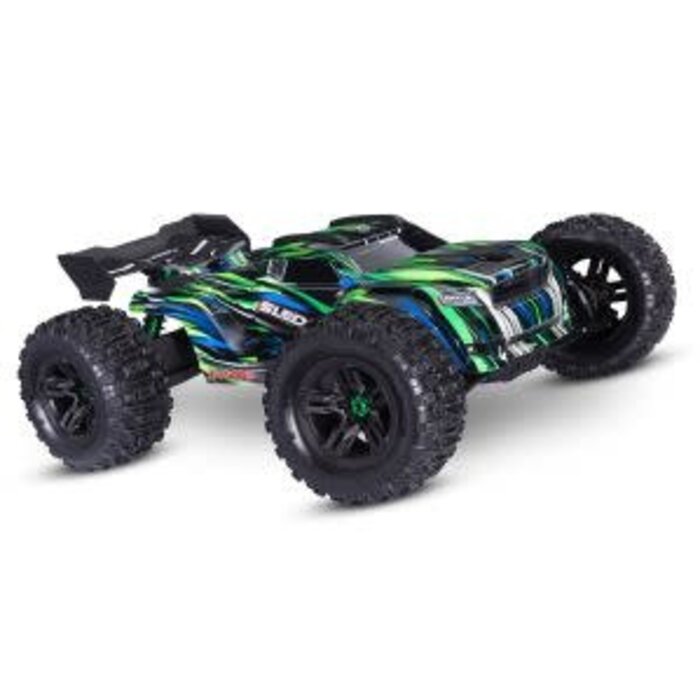Traxxas Sledge® 1/8 scale 4WD brushless monster truck. Fully assembled, Ready-To-Race®, with TQi™ 2.4GHz radio system, VXL-6s™ power system, belted Sledgehammer® tires, and ProGraphix® clipless body.