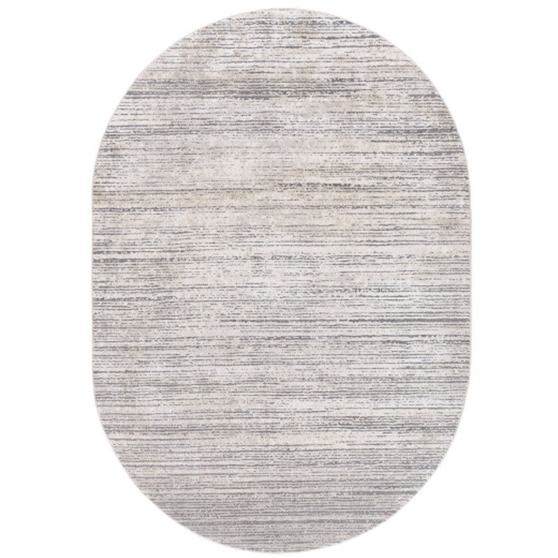 TIBETAN STRIEE OVAL 6'7" X 9'6" TAUPE