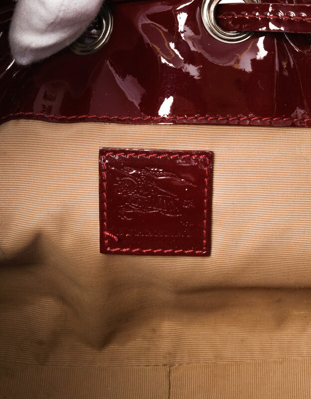 BURBERRY LONDON BURGUNDY PATENT NOVA CHECK WARRIOR SHOULDER BAG