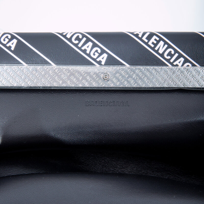 BALENCIAGA BALENCIAGA ALL OVER LOGO HARD FOLDED POCHETTE CLUTCH