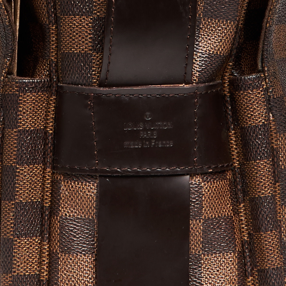 LOUIS VUITTON DAMIER EBENE NAVIGLIO SHOULDER/MESSENGER BAG, with adjustable  dark brown fabric shoulder strap, gold tone hardware and dark brown leather  trims, top zip closure and two overlaying flaps with snap closure