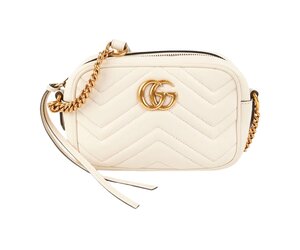 white Gucci marmont camera bag with military jacket