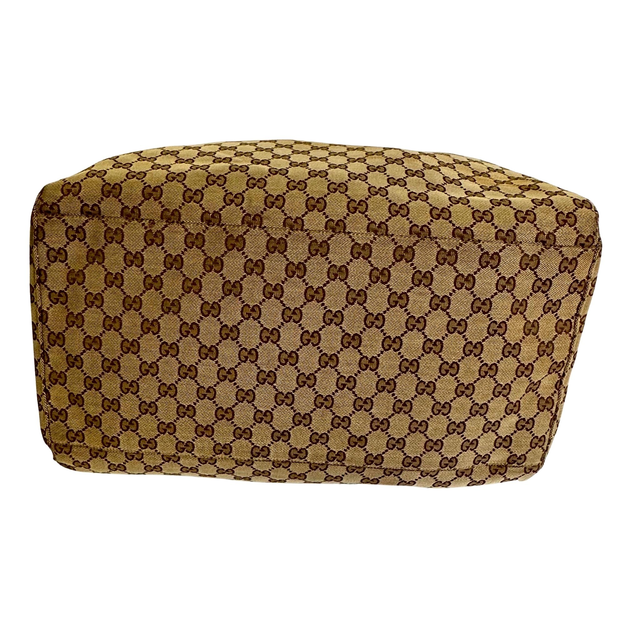 Gucci monogram-embossed wash bag