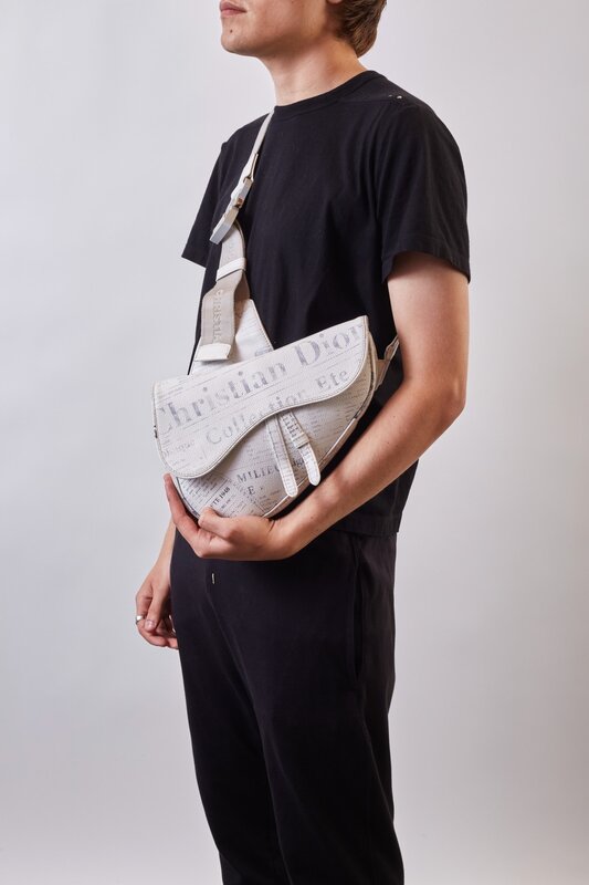 CHRISTIAN DIOR DIOR X DANIEL ARSHAM GRAINED CALFSKIN WHITE NEWSPAPER PRINT SADDLE BAG