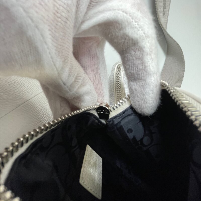 CHRISTIAN DIOR DIOR X DANIEL ARSHAM GRAINED CALFSKIN WHITE NEWSPAPER PRINT SADDLE BAG
