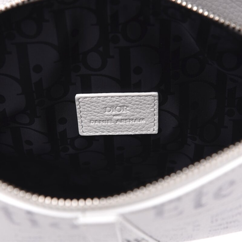 CHRISTIAN DIOR DIOR X DANIEL ARSHAM GRAINED CALFSKIN WHITE NEWSPAPER PRINT SADDLE BAG